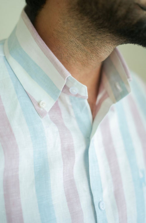 Close-up of a person wearing a  luxento striped shirt 